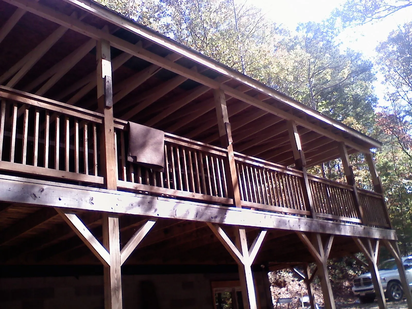 Timber framing under a new elevated porch and deck — Roof Leak Repair in Salem by Roofing Brothers